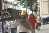 The funeral procession from Massey to Dominion to highlight the whole cradle to grave destructive force of coal